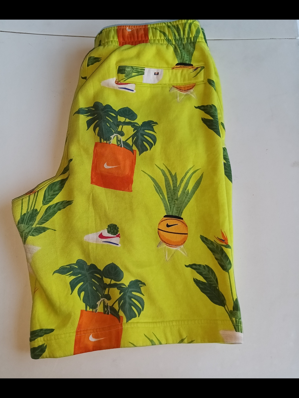 Nike Neon Green Tropical Print Shorts with Orange Accents
